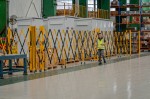 abb-person-walking-in-front-of-portaguard-expandable-barrier.jpg