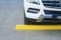b.compliance-wheel-stop-in-use.jpg